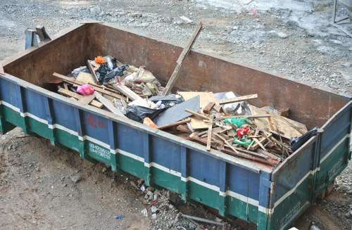 Cluttered garage being organized in Forest Gate