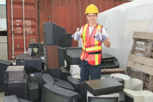 House clearance team organizing items in Forest Gate home