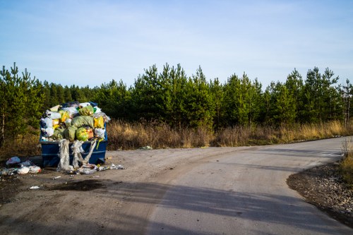 Workers sorting construction debris