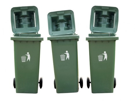 Workers wearing PPE beside waste containers during a refuse collection shift